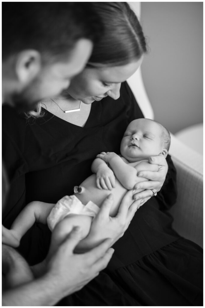 black and white photo holding baby